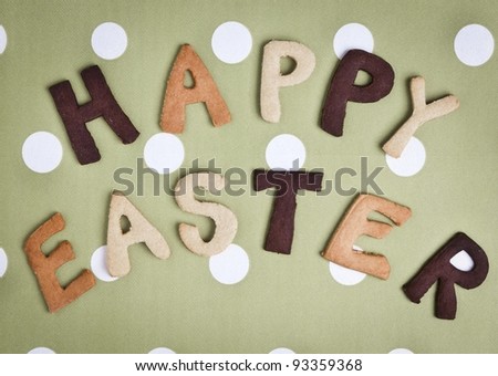 Happy Easter Card On grey green fabric. Words HAPPY EASTER on a tureen fabric background, festive card for Easter holiday.