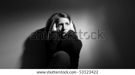 Young woman suffering from severe depression/anxiety