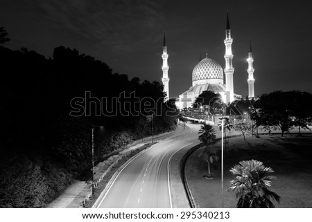 View of Sultan Salahuddin Abdul Aziz Shah Mosque in black white, Malaysia.  Image has grain or blurry or noise and soft focus when view at full resolution.  (Shallow DOF, slight motion blur)