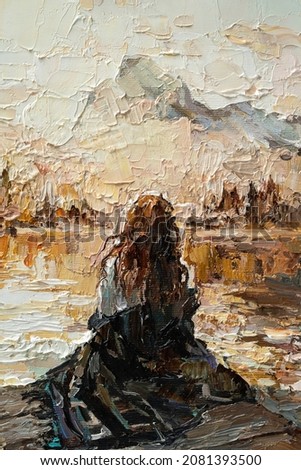 The girl in the rays of the setting sun. The woman is sitting on the shore of the lake. Oil painting on canvas.