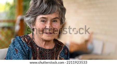 Image, Stock Photo 60 year old lady with scarf in autumn landscape