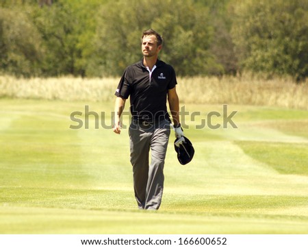 GIOVINAZZO , CARMINE  - NOVEMBER 17: Actor Guest Player Playing at Gary Player Charity Invitational Golf Tournament  November  17, 2013, Sun City, South Africa. Carmine walking down fairway.