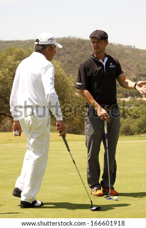 GIOVINAZZO , CARMINE  - NOVEMBER 17: Actor Guest Player Playing at Gary Player Charity Invitational Golf Tournament  November  17, 2013, Sun City, South Africa. Carmine getting a tip from the master.