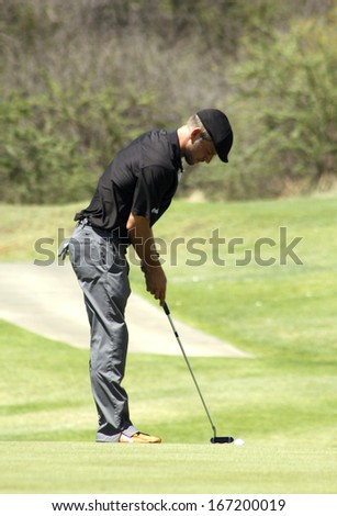 GIOVINAZZO , CARMINE  - NOVEMBER 17: Actor Guest Player Playing at Gary Player Charity Invitational Golf Tournament  November  17, 2013, Sun City, South Africa. Carmine putting.