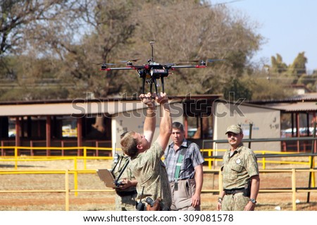 THABAZIMBI, SOUTH AFRICA - August 1:  Farm Community Security displaying drone with camera to trace thieves and attackers at the Thabazimbi Show, on August 1, 2014 at Thabazimbi, South Africa.