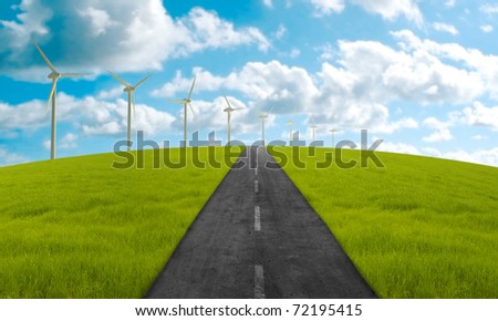 Road in green meadow towards the clean energy system
