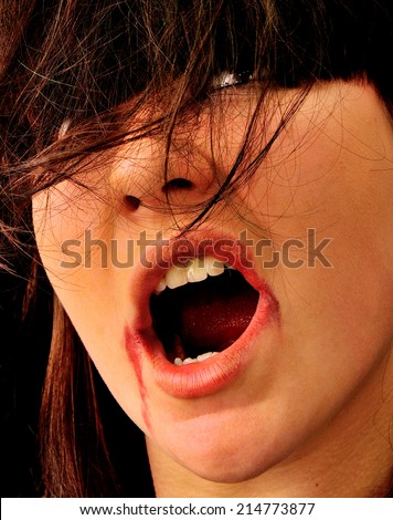 Screaming woman with scary makeup