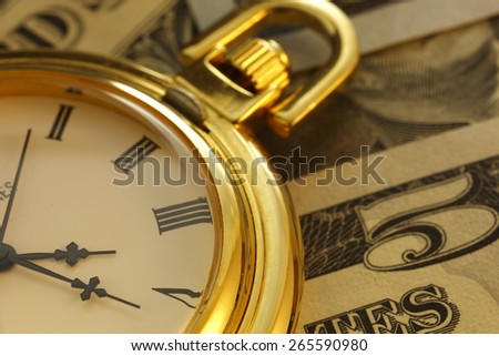 Time is money.  Gold Tone. Close up