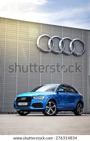 MINSK, BELARUS - MAY 6, 2015: 2015 model year Audi Q3 2.0 TFSI S-line staged near Audi dealer centre in Minsk, Belarus during test drive. Audi Q3 SUV is powered by 2.0 liter turbo (220 hp).