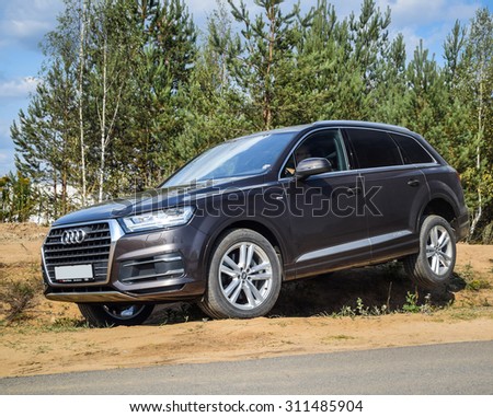 MINSK, BELARUS - AUGUST 28, 2015: 2015 model year all-new Audi Q7 3.0 TFSI at the test drive in Minsk, Belarus. Audi Q7 SUV is powered by 3.0 liter supercharged engine, which produces 333 hp of power.