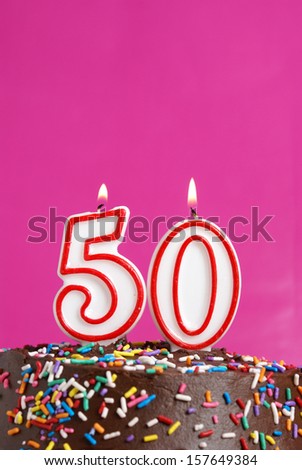 A number candle is lit in celebration of fifty years.