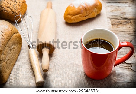 breakfast coffee and bread home made on sackcloth background