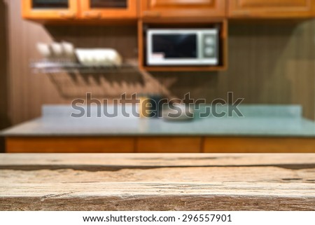 wooden desk space platform on blurred kitchen bench background
