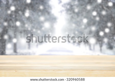 desk space and winter background of landscape white xmas snow for product presentation.