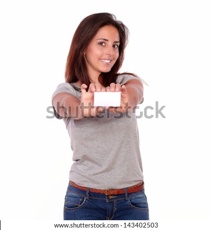 Portrait of a charming lady holding a business card of copyspace on white background