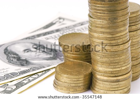 columns of coins and dollar bills
