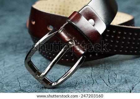 Female belt against from a  leather