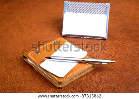 Organizer support for papers and  pen on a textural background