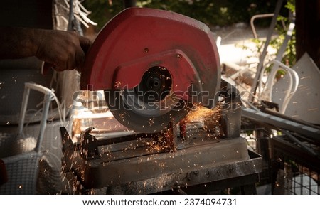 Similar – Image, Stock Photo Blacksmith cutting metal