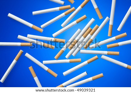 Cigarette on blue background. Cood for anti smoking issues