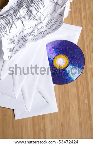 CD disk with envelope on the desk