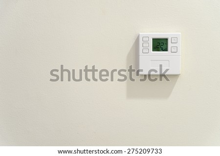air conditioner remote control on the wall