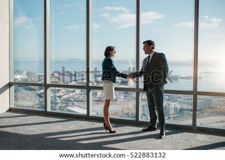 Similar – Image, Stock Photo Business people  in work meeting seen through the glass