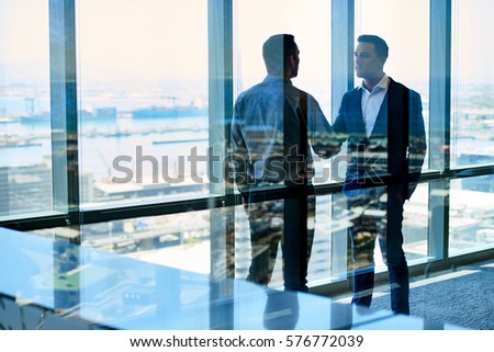 Similar – Image, Stock Photo Meet in the tower. All tables and windows are occupied. The sun goes down and the celebration is without Corona.