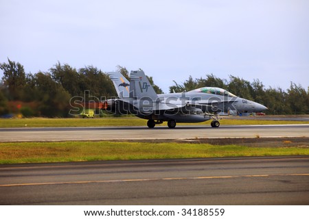 KANEOHE, HI - JULY 23: A flight of United States Marine Corps xFA-18 jet prepares for departure from the Marine Corps Air Station July 23, 2009 in Kaneohe, Hawaii.