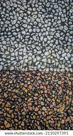 white and orange stones with black concrete Foto stock © 