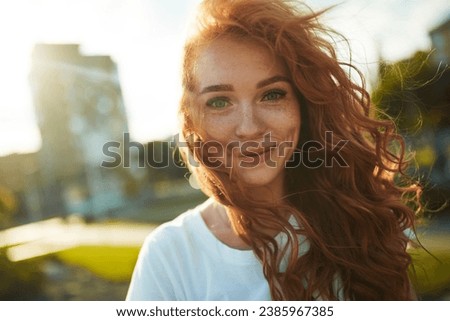 Similar – Image, Stock Photo Lovely redhead woman enjoying the day in a field o sunflowers