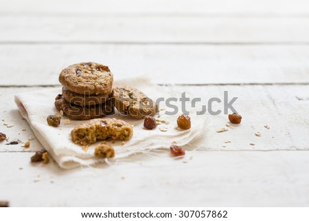 Cookies on white linen napkin on wooden table