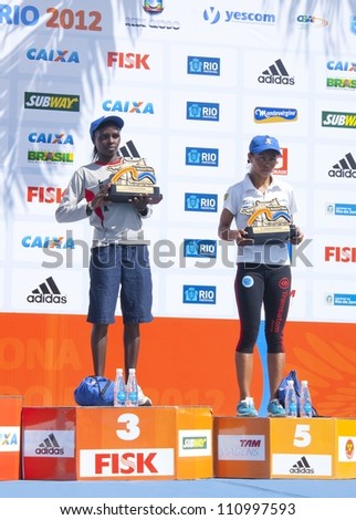RIO DE JANEIRO - AUGUST 19: Rumokol Chepkanan and Sueli Pereira da Silva at podium  in XVI Meia Maratona Internacional do Rio de Janeiro, August, 19, 2012, Rio de Janeiro, Brazil.