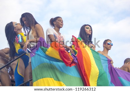 RIO DE JANEIRO - NOV 18: Participants of the Gay Parade dress to character at  allegorical car. Event 17 Parada do Orgulho LGBT Rio 2012 at November 18, 2012 in Rio de janeiro, Brazil
