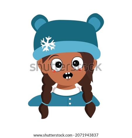 Girl with emotions panic, surprised face, shocked eyes of African American or Latin nationality in bear hat with snowflake. Cute baby with scared expression in winter headdress. Head of adorable child