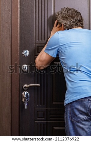 Similar – Image, Stock Photo Elderly man looking through window in twilight