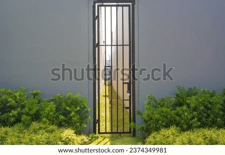 Similar – Image, Stock Photo Wooden gate between two houses with no trespassing sign.