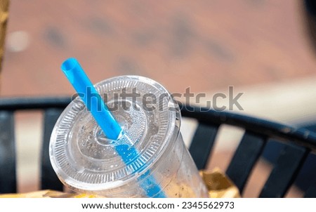 Image, Stock Photo Plastic straws thrown in ocean. Pollution concept. Flat lay on pink background