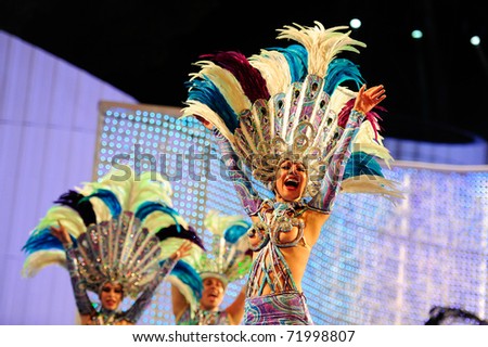 LAS PALMAS - FEBRUARY 20: Comparsa Araguime, winning dance group, from Canary Islands, performs onstage during the carnival' dance group competition for adults on February 20, 2011 in Las Palmas, Spain