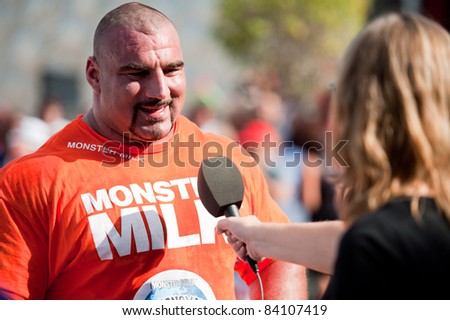 CANARY ISLANDS – SEPTEMBER 03: Ervin Katona from Serbia, with highest score gives interview during Strongman Champions League at Las Palmas September 03, 2011 in Canary Islands, Spain