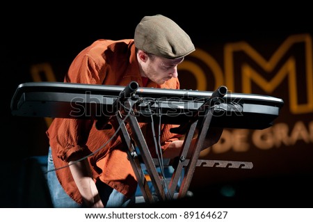CANARY ISLANDS - NOVEMBER 12: Chapelier Fou from Francia playing in his one-man-band onstage during Womad 2011 November 12, 2011 in Las Palmas, Canary islands, Spain