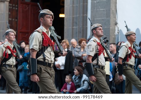 LAS PALMAS, SPAIN-APRIL 2: Unidentified soldiers, from the Spanish Legion, marching, during Palm Sunday marching procession on April 2, 2012 in Las Palmas, Spain