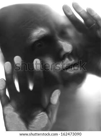 Hybrid monochromatic image of a bald man/being pressed against a glass window/barrier. This image is constructed through scans and digital image manipulation/painting.