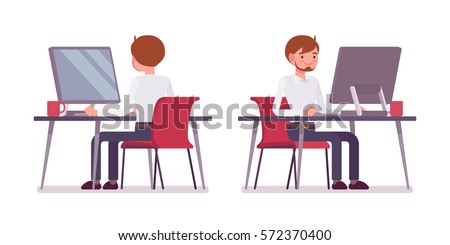 Young happy male clerk sitting at the desk and working at the computer, looking at screen, rear and front view, comfortable workspace, friendly office, effective employee, organized manager