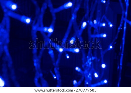 Beautiful defocused LED lights  filtered bokeh abstract with blue tone background.