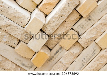 Facing bricks stacked in a warehouse building base