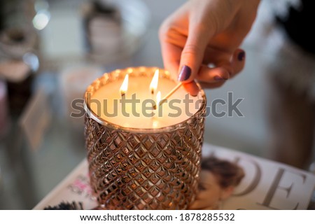 Candle burning, Detail of candle flames alight, lights from candles burning up close, flame burn candle lighting elegant details