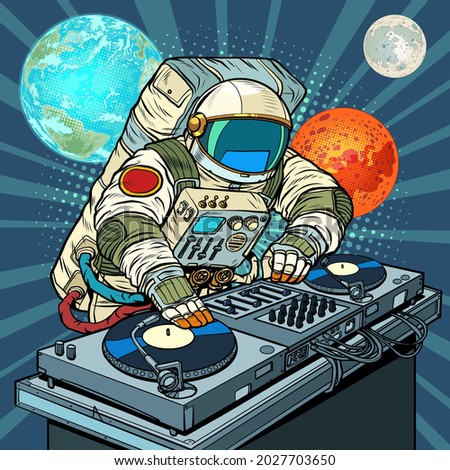 astronaut cosmonaut dj on vinyl turntables. concert music performance