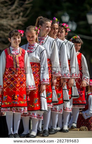 RAZLOG, BULGARIA - APRIL 13, 2015: Female Bulgarian folklore dancers during the traditional folklore festival 