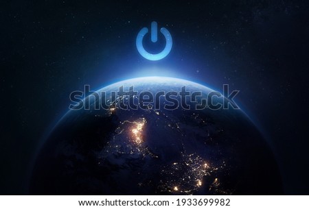 Surface of Earth planet in dark outer space. Earth hour. Our home. Power and electricity. Elements of this image furnished by NASA 商業照片 © 